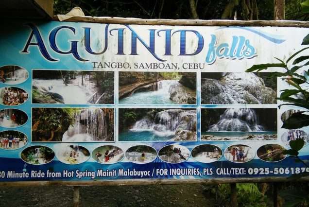 Aguinid Falls sign in Samboan Cebu. Highlights of Oslob Whale Shark & Aguinid Falls Day Tour.