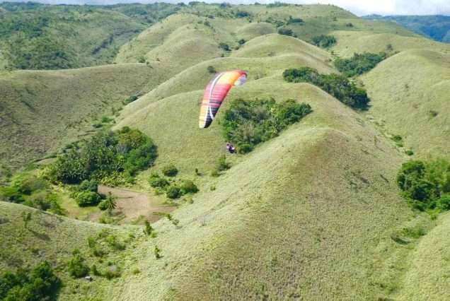 Rolling Green hills of Paragliding in Oslob, Cebu - highlights of Oslob Paragliding Day Tours
